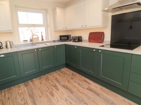 Fridge, electric kettle, toaster, cookware/dishes/utensils