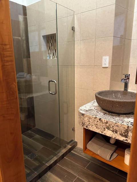 Junior Room, 1 Bedroom, Non Smoking, Garden View | Bathroom | Shower, rainfall showerhead, hair dryer, towels