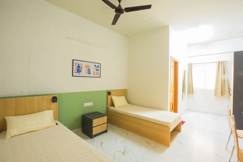 Shared Dormitory, 3 Twin Beds, Non Smoking, City View | Desk, laptop workspace, soundproofing, free WiFi