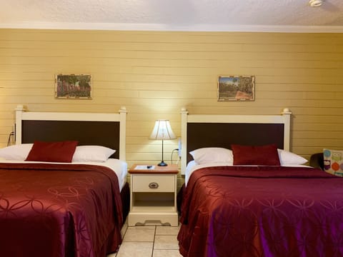 Standard Room, Multiple Beds, Non Smoking | In-room safe, desk, soundproofing, iron/ironing board