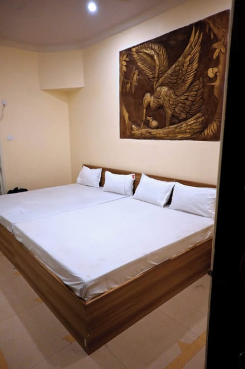 Deluxe Quadruple Room, City View | Desk, soundproofing, free WiFi, bed sheets