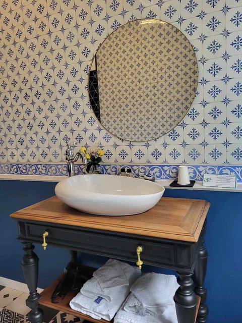 Superior Suite, Hot Tub | Bathroom | Free toiletries, hair dryer, towels, soap