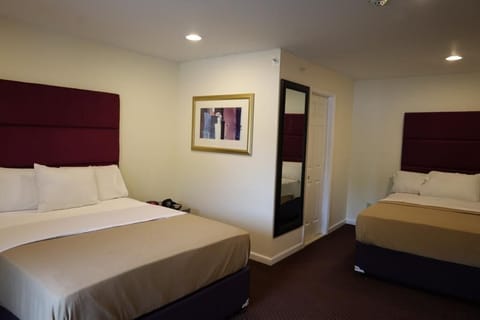 Deluxe Double Room | Select Comfort beds, desk, soundproofing, iron/ironing board