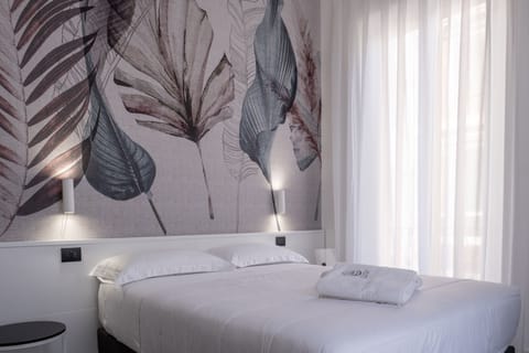 Frette Italian sheets, premium bedding, down comforters