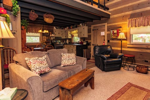 Cabin, 1 King Bed | Living area | 32-inch flat-screen TV with cable channels, TV