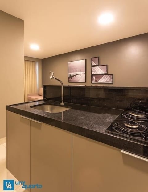 Apartment | Private kitchen | Microwave, stovetop, cookware/dishes/utensils, dining tables