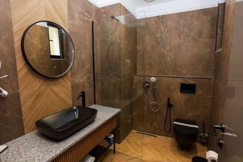 Deluxe Family Room, Sea View | Bathroom | Bathrobes, slippers, towels