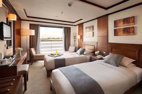 Deluxe Twin Room, Balcony, River View | Pillowtop beds, free minibar, bed sheets