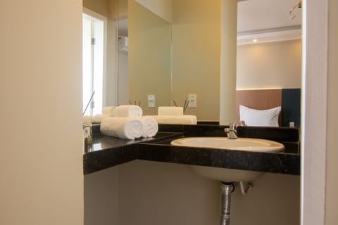 Standard Double Room | Bathroom | Shower, hair dryer, towels, soap