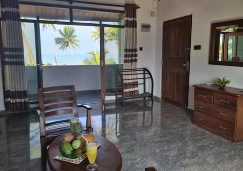 Family Room, Balcony, Ocean View | Soundproofing, free WiFi, bed sheets