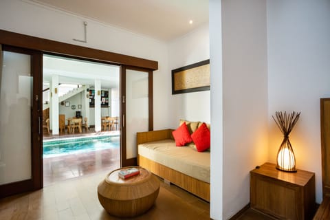 Deluxe Room, Pool Access | Minibar, in-room safe, desk, rollaway beds