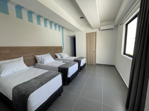 Ziruma triple room | Free WiFi, bed sheets