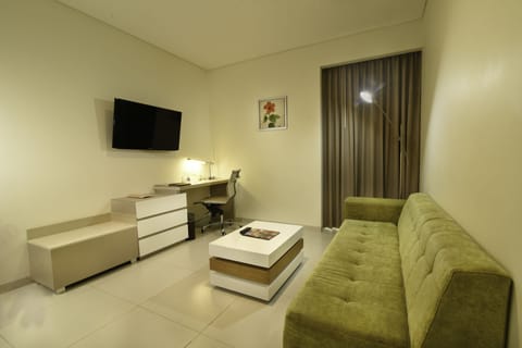 Suite, 2 Double Beds | Living room | Flat-screen TV, iPod dock, MP3 dock