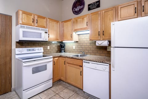 Condo, 2 Bedrooms | Private kitchen | Full-size fridge, microwave, stovetop, dishwasher