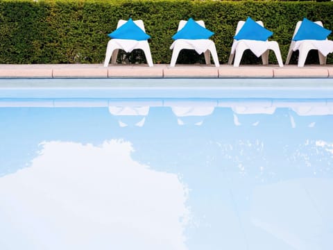 Seasonal outdoor pool, pool umbrellas, sun loungers