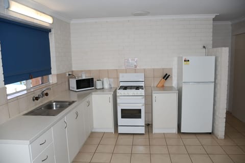 Two Bedroom Waterfront Unit | Private kitchen | Fridge, microwave, coffee/tea maker, electric kettle