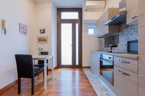 Apartment | Private kitchen | Full-size fridge, microwave, stovetop, electric kettle