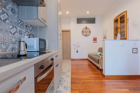 Apartment | Private kitchen | Full-size fridge, microwave, stovetop, electric kettle