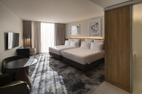 Junior Suite, 2 Queen Beds | Premium bedding, minibar, in-room safe, individually furnished