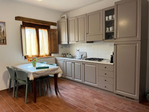 Elite Apartment | Private kitchen | Full-size fridge, stovetop, espresso maker, coffee/tea maker