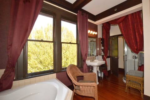 Honeymoon Room | Bathroom | Hair dryer, bathrobes, towels