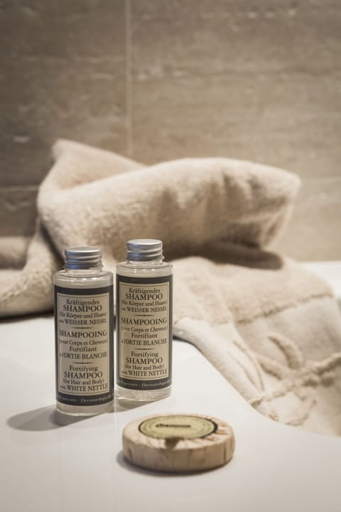 Junior Suite, Balcony | Bathroom amenities | Hair dryer, bathrobes, towels