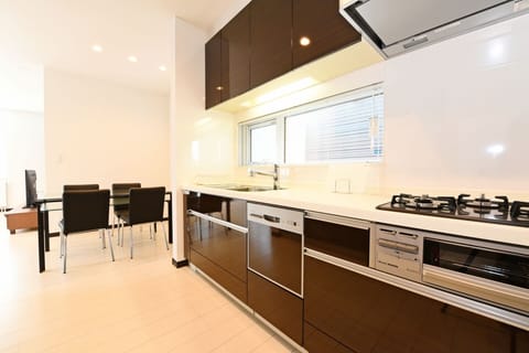 Family Suite | Private kitchen | Full-size fridge, microwave, stovetop, electric kettle