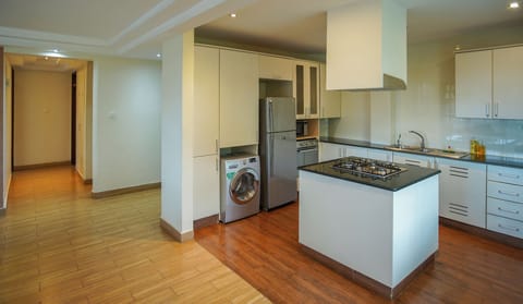 2- Bedroom apartment | Private kitchen | Full-size fridge, microwave, oven, stovetop