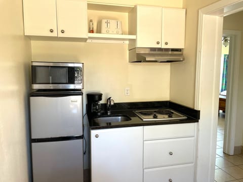 Deluxe 2 Room Suite with Two Queen Beds and Kitchen | Private kitchen | Fridge, microwave, coffee/tea maker