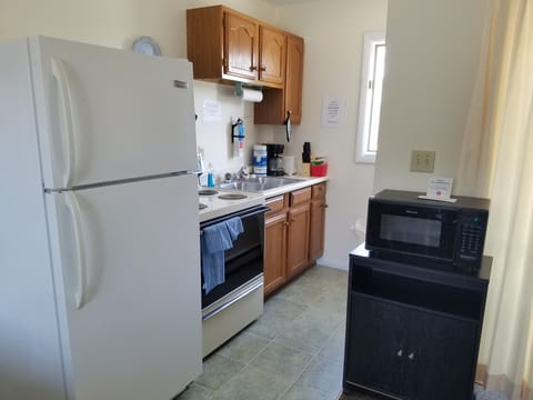 Suite, Non Smoking | Private kitchen | Fridge, microwave