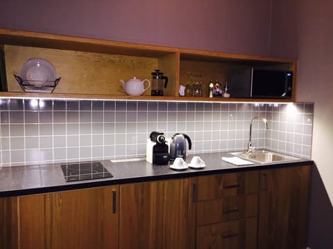 Deluxe Apartment, Kitchen | Private kitchenette | Fridge, microwave, espresso maker, coffee/tea maker