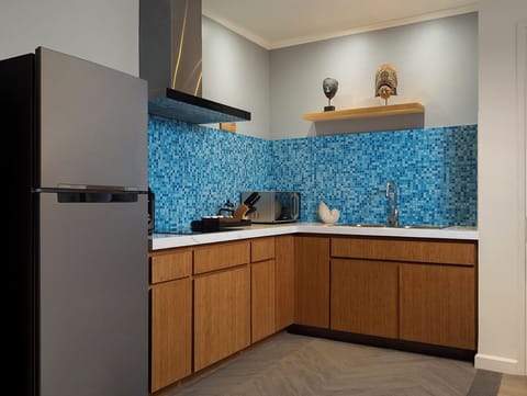 Two Bedroom Apartment Suite | Private kitchen | Fridge, electric kettle