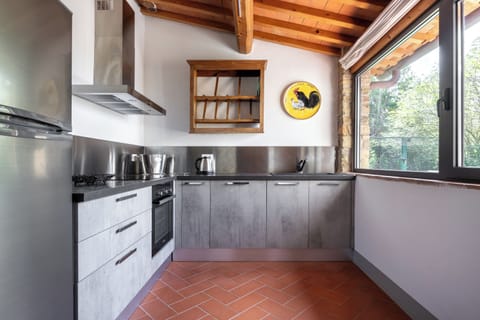 Villa | Private kitchen | Full-size fridge, oven, stovetop, dishwasher