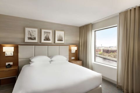 Suite, 1 King Bed, River View | 1 bedroom, hypo-allergenic bedding, in-room safe, desk