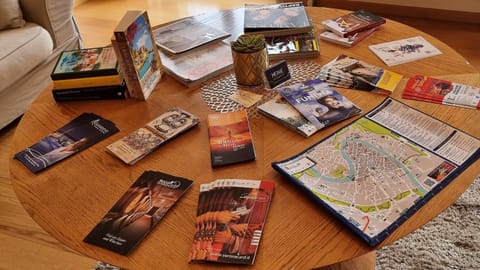 21-inch flat-screen TV with cable channels, TV, books