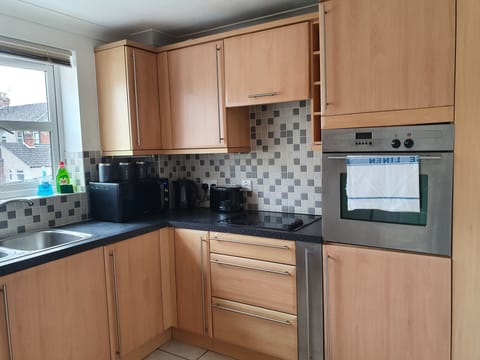 Standard Apartment, 2 Bedrooms | Private kitchen | Full-size fridge, microwave, oven, stovetop