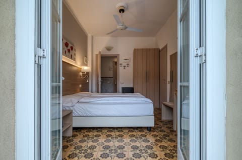 Deluxe Room, Terrace | Minibar, desk, free WiFi, bed sheets