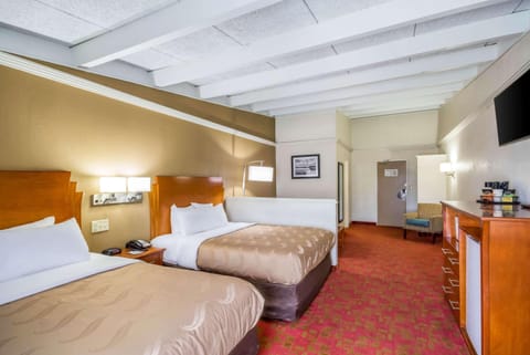 Suite, 2 Queen Beds | In-room safe, desk, iron/ironing board, free cribs/infant beds