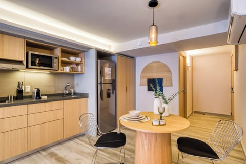 Exclusive Suite | Private kitchen | Fridge, microwave, stovetop, espresso maker