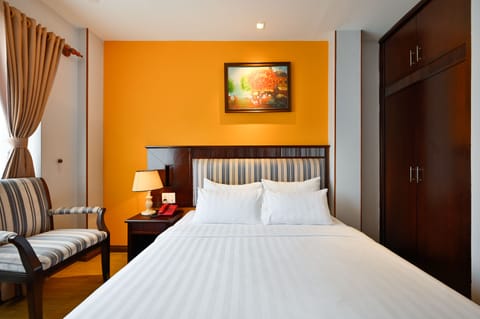 Superior Double Room | Living area | Flat-screen TV