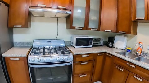 Family Suite, 2 Bedrooms, Lake View, Lakeside | Private kitchen | Full-size fridge, microwave, coffee/tea maker, toaster