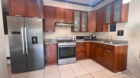 Family Suite, 2 Bedrooms, Lake View, Lakeside | Private kitchen | Full-size fridge, microwave, coffee/tea maker, toaster