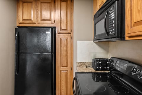 Condo | Private kitchen | Full-size fridge, microwave, oven, stovetop