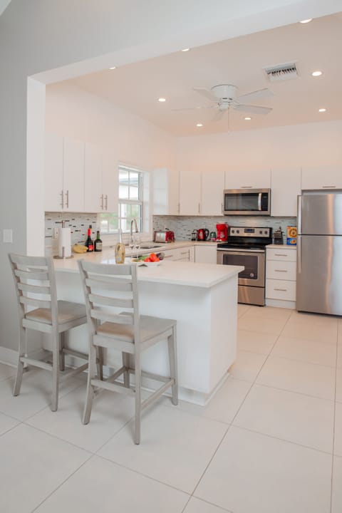 Comfort Apartment | Private kitchen | Full-size fridge, microwave, oven, stovetop