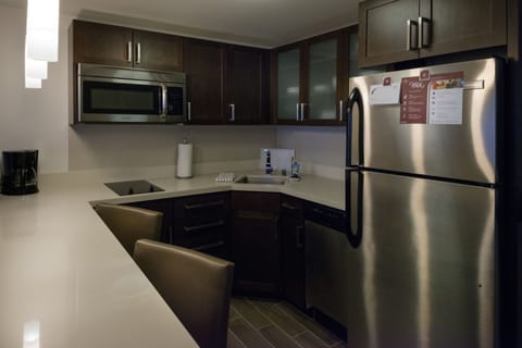 Full-size fridge, microwave, stovetop, dishwasher