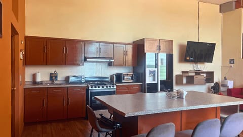 Villa | Private kitchen | Full-size fridge, microwave, dishwasher, toaster