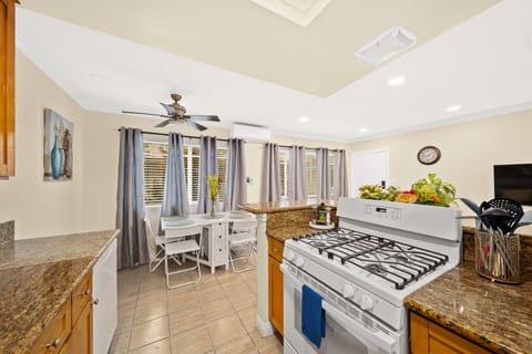 Comfort Apartment | Private kitchen | Full-size fridge, microwave, oven, stovetop