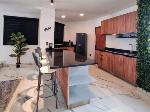 Superior Condo | Private kitchen | Full-size fridge, microwave, espresso maker, rice cooker