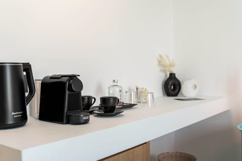 Standard Room, Pool View | Coffee and/or coffee maker