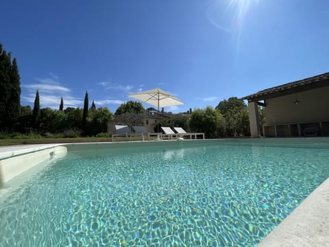 Outdoor pool, pool umbrellas, sun loungers